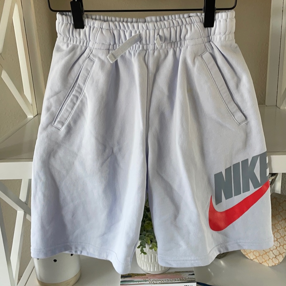 Boys Nike shorts sz L blue with crimson swoosh